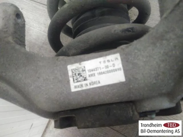 Tesla MODEL 3 2017--> Strut assembly, front left view 4