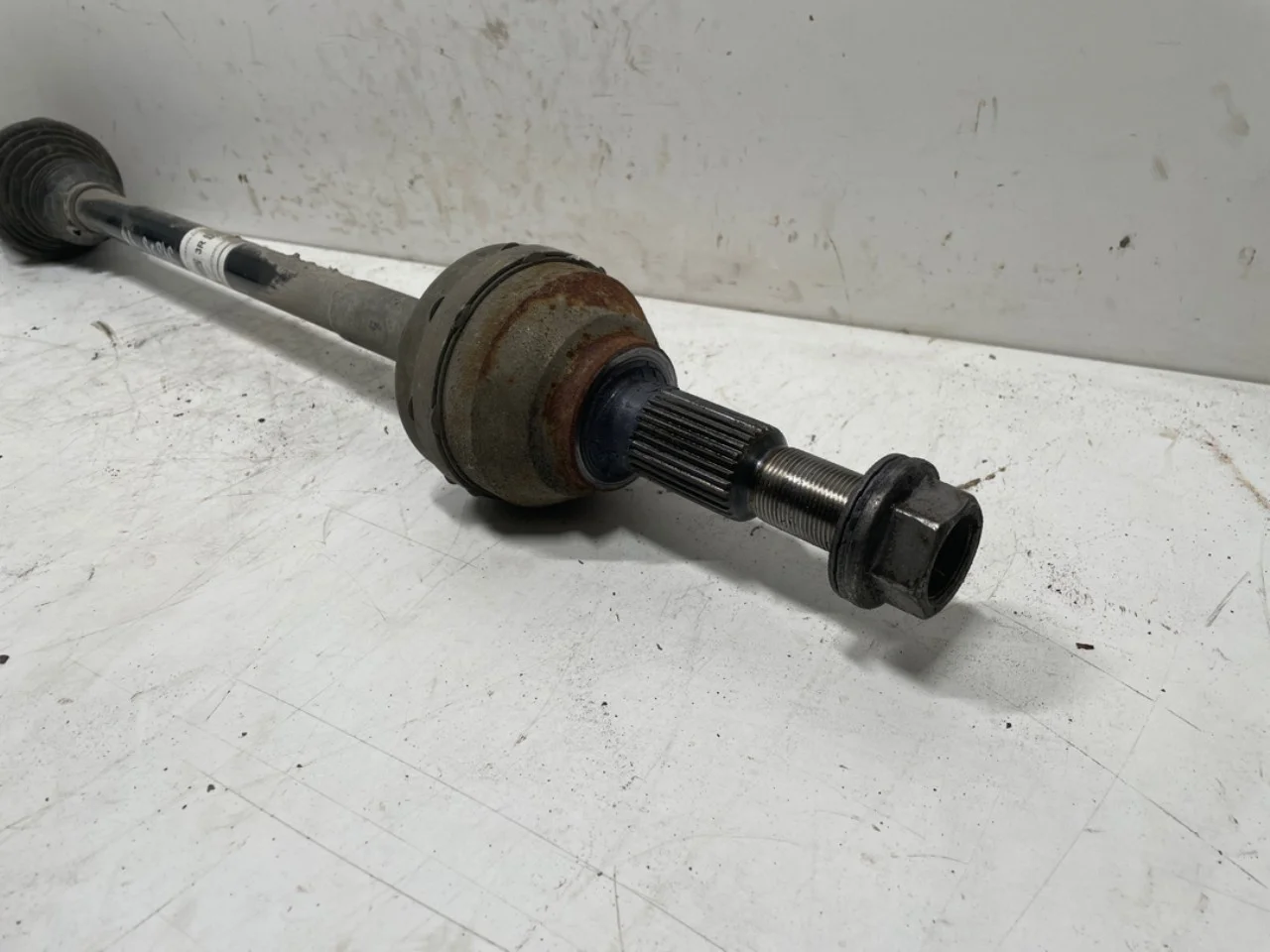 Tesla MODEL 3 2024- Rear left driveshaft view 2