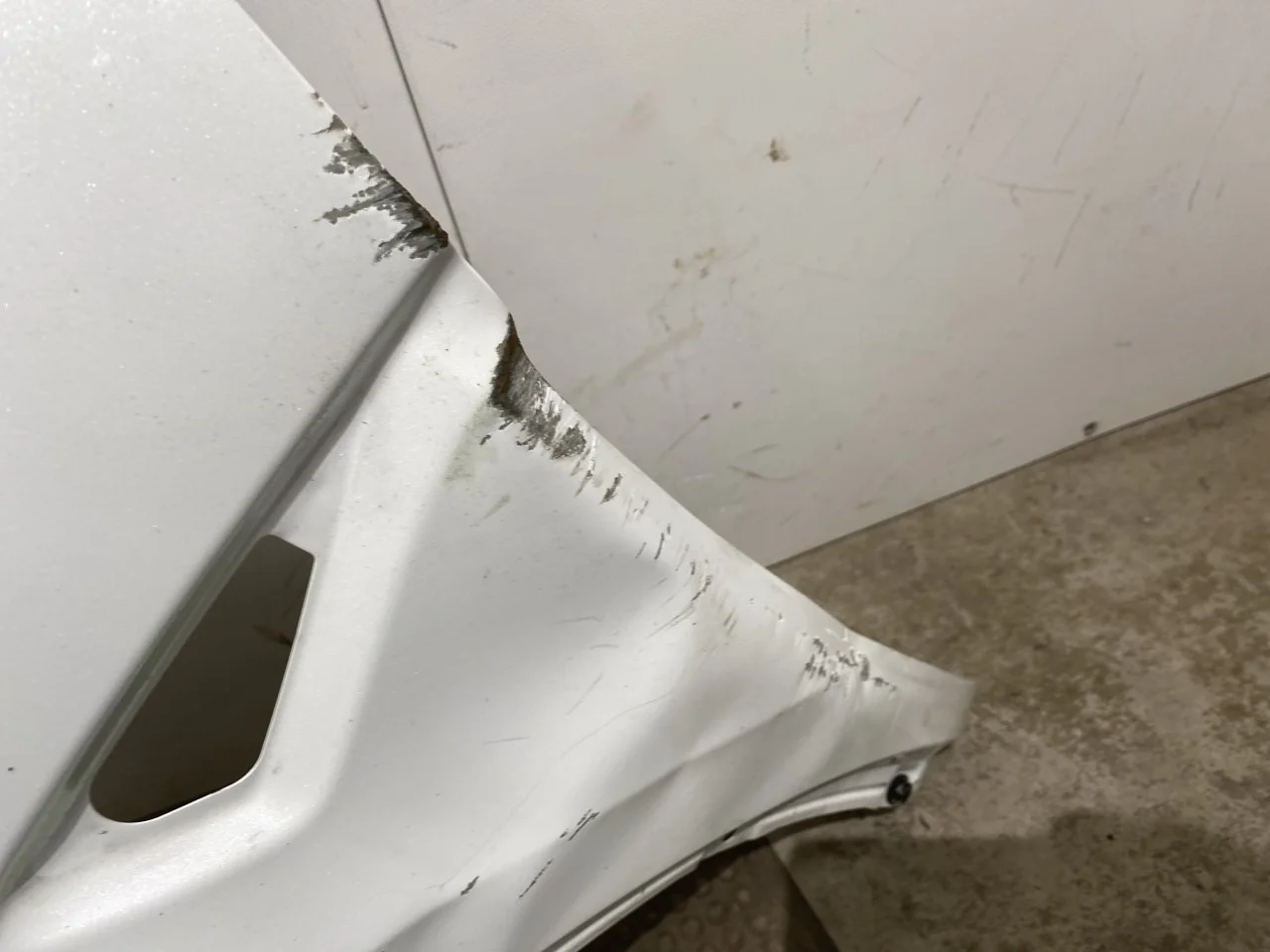 Tesla MODEL Y 2021- Front left fender view 3