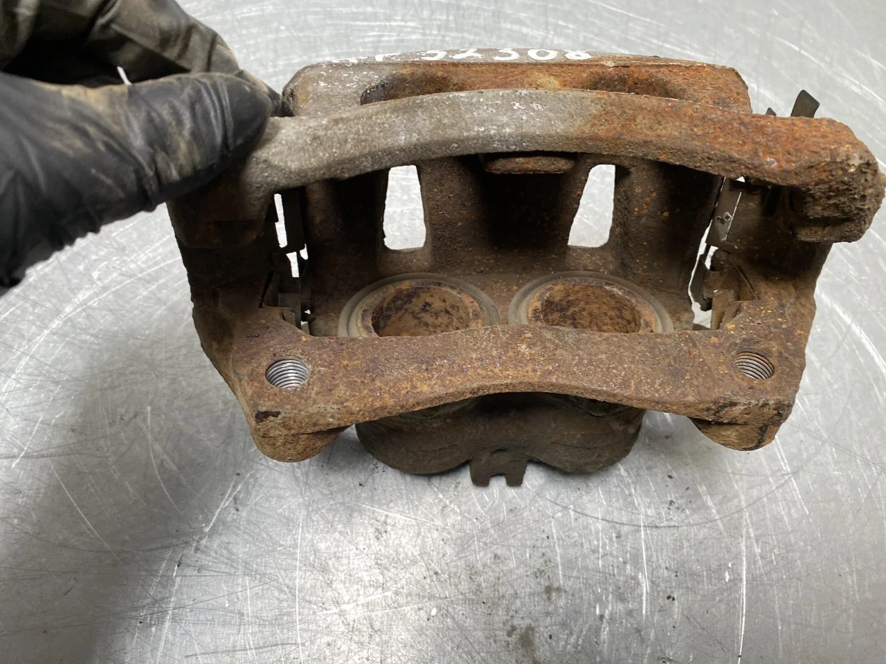 Nissan LEAF 2017-24 Front right brake caliper view 3