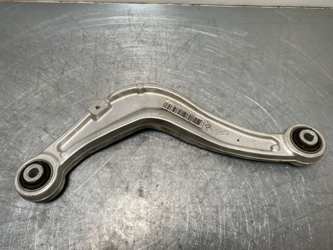 Volvo EX30 2024- Control arm, rear right view 2