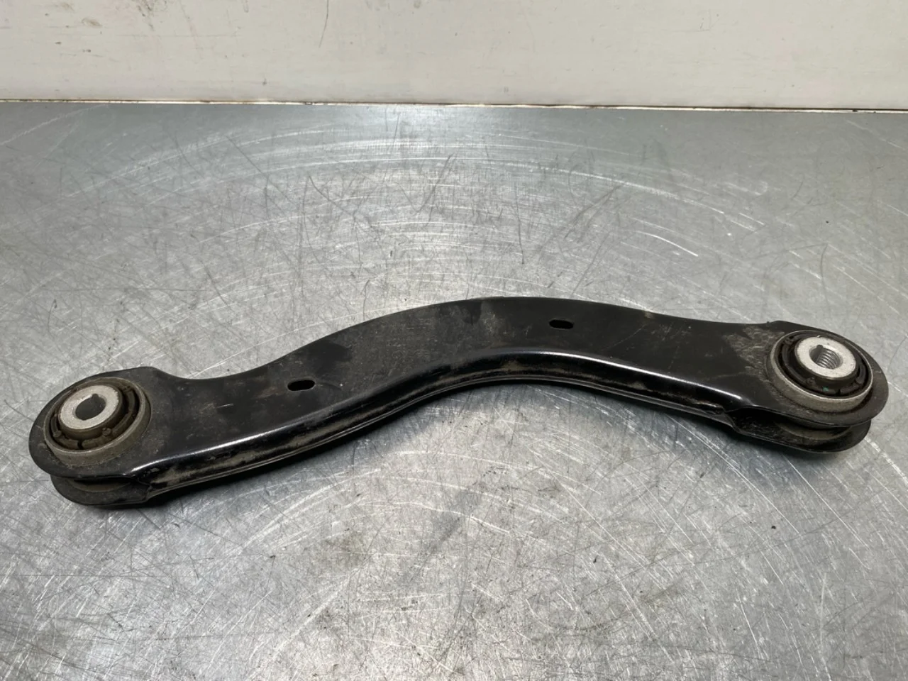 Volvo EX30 2024- Control arm, front right, upper view 2