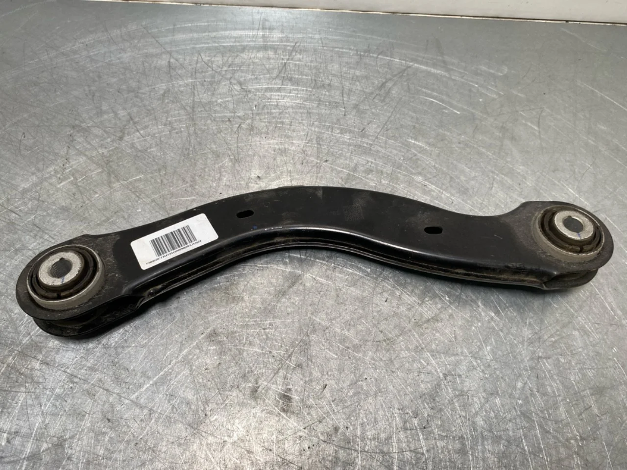 Volvo EX30 2024- Control arm, front left upper view 2