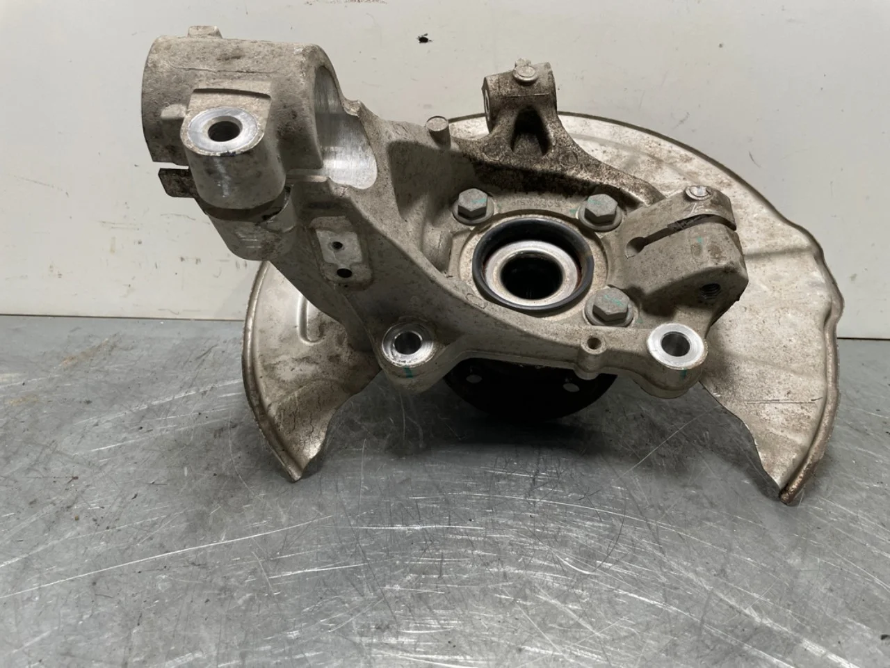 Front right steering knuckle view 4