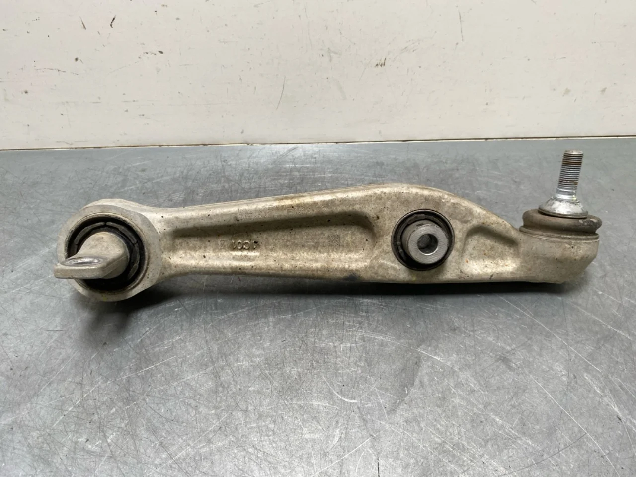 Tesla MODEL Y 2021- Front left control arm view 2