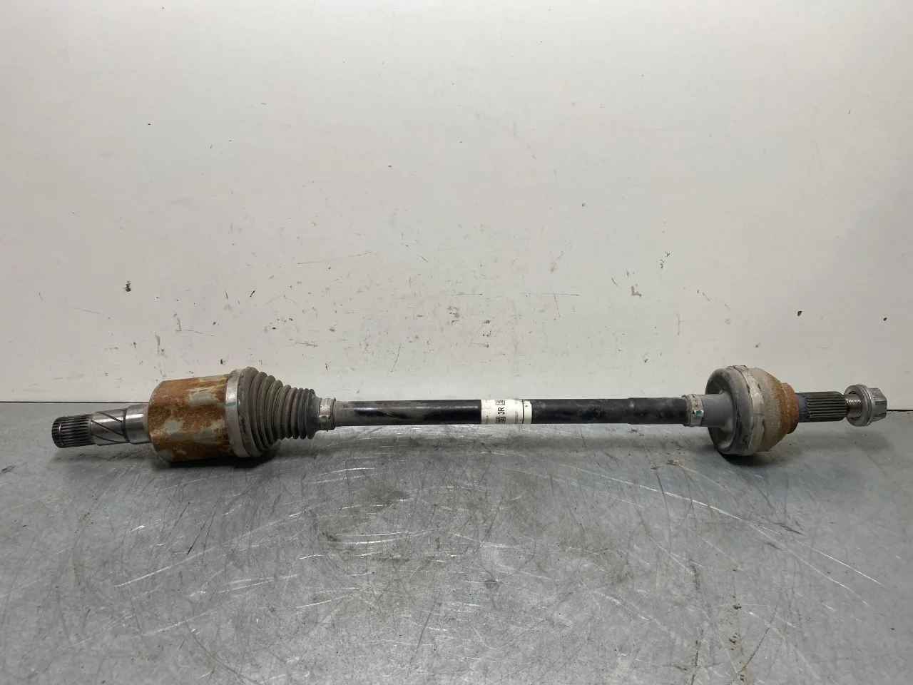 Tesla MODEL 3 2024- Rear left driveshaft view 2