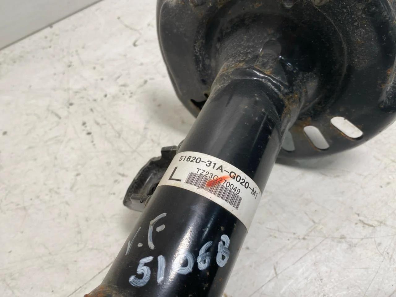 Honda E:NY1 2023- Strut assembly, front left view 4