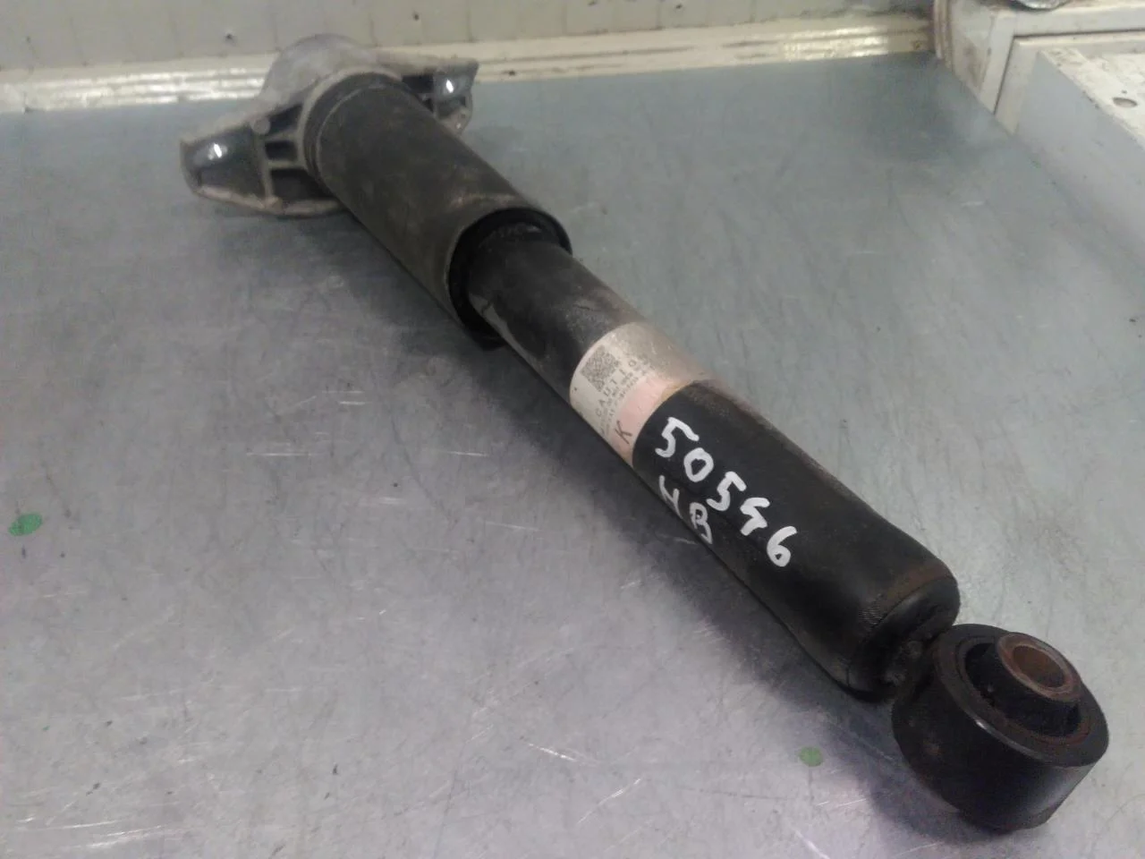 Nissan ARIYA 2021- Shock absorber, rear