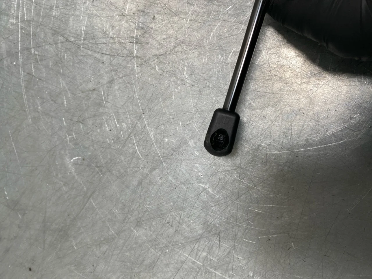 Hood gas strut view 4